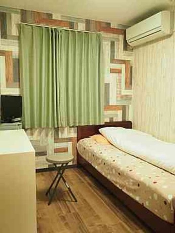 Imagen de la habitación del Hotel Business Kaga. Foto 8