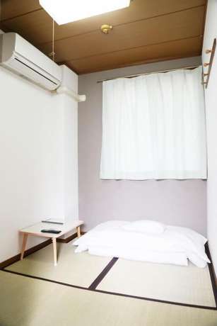 Imagen de la habitación del Hotel Business Kaga. Foto 11