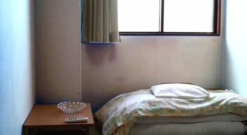 Imagen de la habitación del Hotel Business Kaga. Foto 12