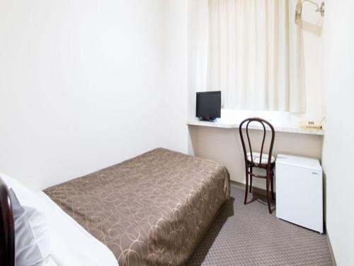 Imagen de la habitación del Hotel Business Kawashima, Wakayama. Foto 17