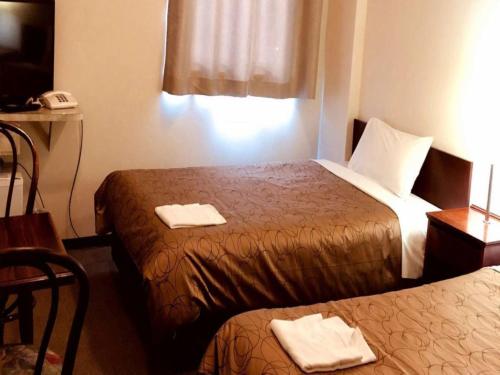 Imagen de la habitación del Hotel Business Kawashima, Wakayama. Foto 19