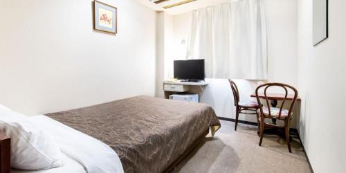 Imagen general del Hotel Business Kawashima, Wakayama. Foto 13