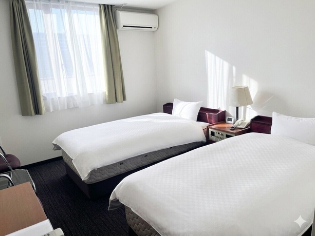 Imagen de la habitación del Hotel Business Kei. Foto 2