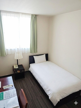 Imagen de la habitación del Hotel Business Kei. Foto 4