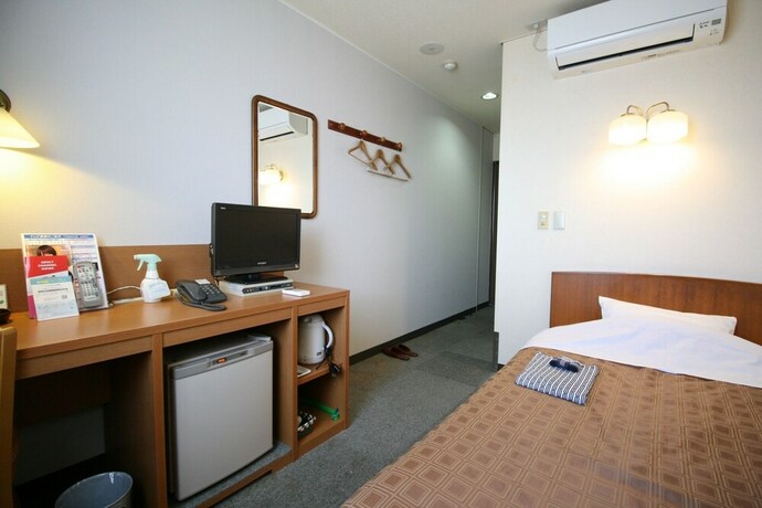 Imagen de la habitación del Hotel Business Kohoku. Foto 7