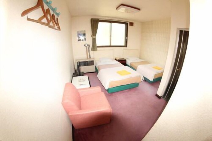 Imagen de la habitación del Hotel Business Koraku. Foto 9