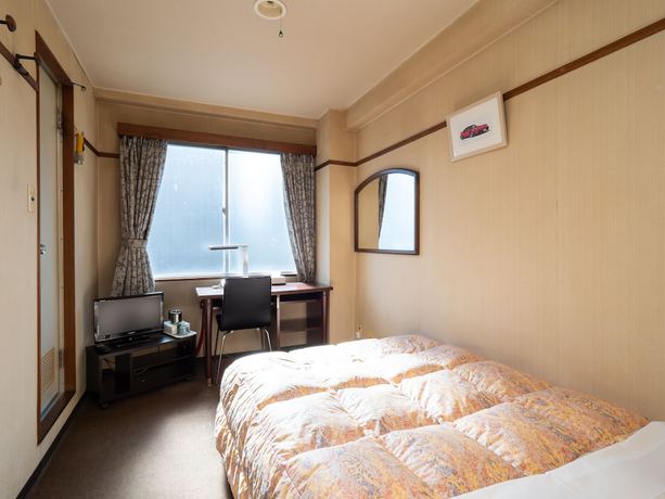 Imagen de la habitación del Hotel Business Nakayama. Foto 6