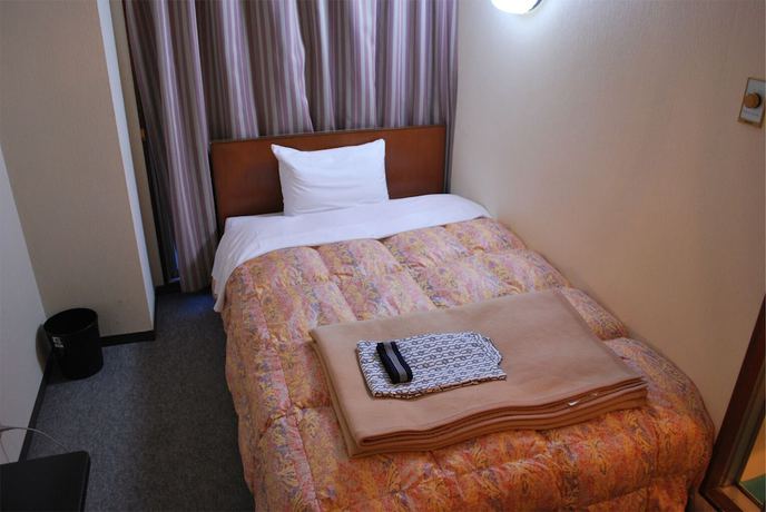 Imagen de la habitación del Hotel Business Nakayama. Foto 9