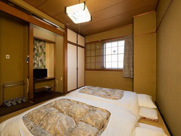 Imagen de la habitación del Hotel Business Nakayama. Foto 10
