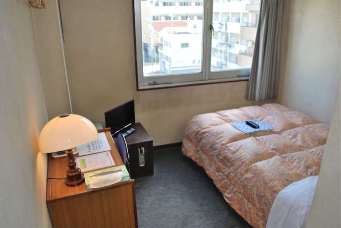Imagen de la habitación del Hotel Business Nakayama. Foto 11