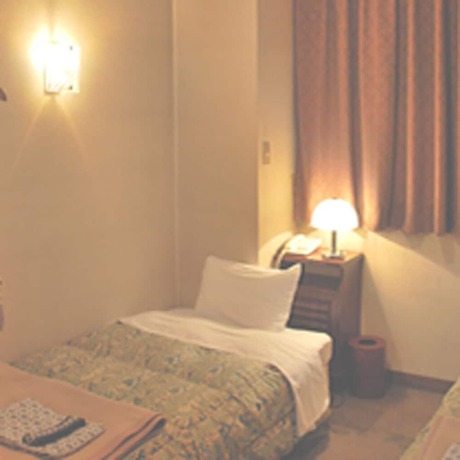 Imagen de la habitación del Hotel Business Nakayama. Foto 17