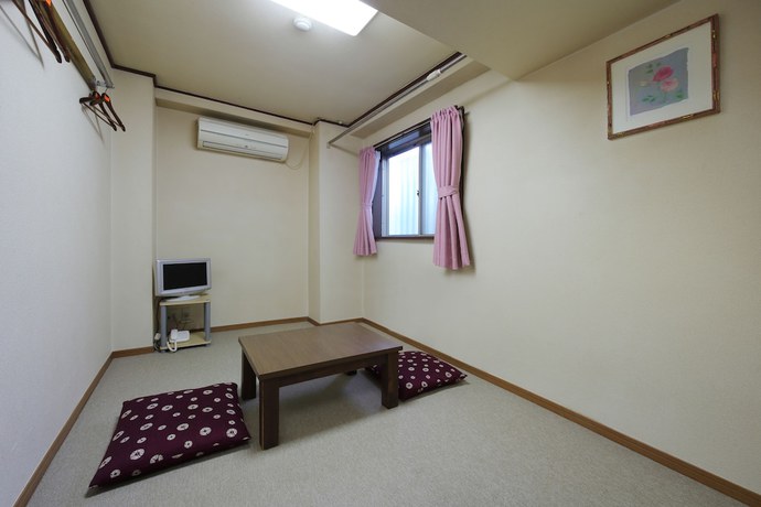 Imagen de la habitación del Hotel Business Ryokan Otamaya. Foto 17