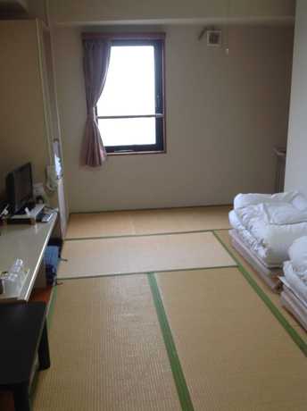 Imagen de la habitación del Hotel Business Sakai. Foto 15