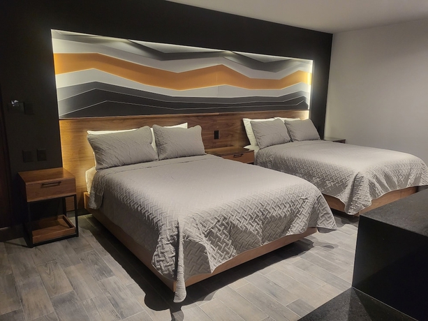 Imagen de la habitación del Hotel Business Suites Mine. Foto 2