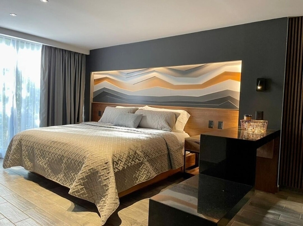 Imagen de la habitación del Hotel Business Suites Mine. Foto 4