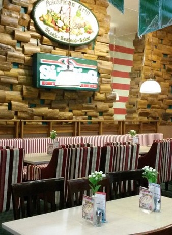 Imagen del bar/restaurante del Hotel Business Tomang. Foto 2