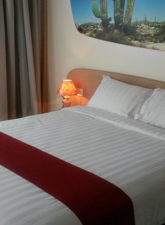 Imagen de la habitación del Hotel Business Tomang. Foto 3