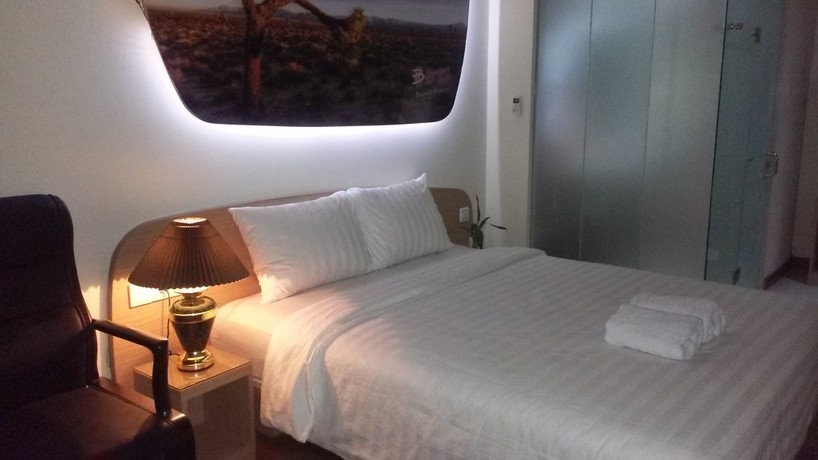 Imagen de la habitación del Hotel Business Tomang. Foto 4