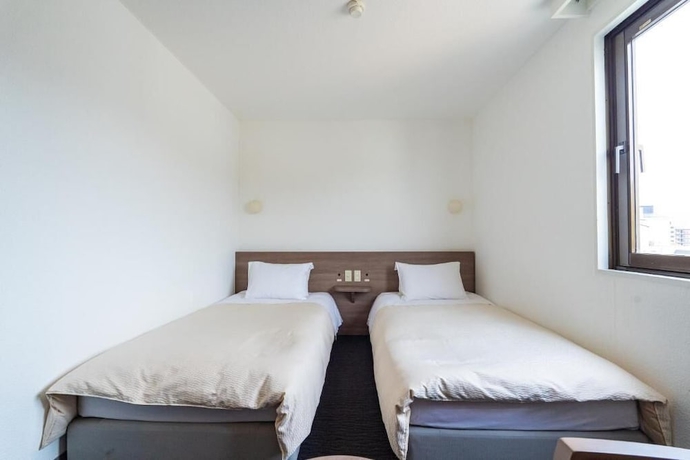 Imagen de la habitación del Hotel Business Ueno. Foto 15