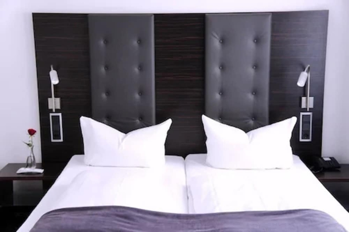 Imagen de la habitación del Hotel Business Wieland. Foto 7