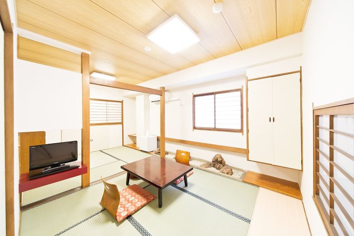 Imagen de la habitación del Hotel Business Yamashiro. Foto 3