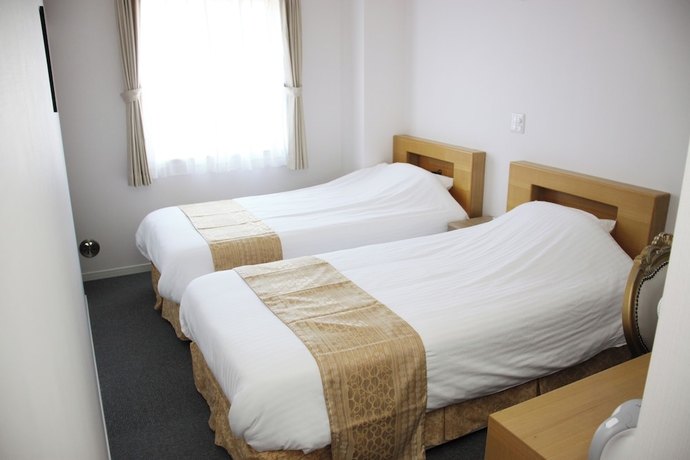 Imagen de la habitación del Hotel Business Yamate Inn. Foto 4