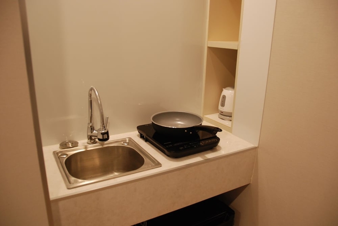 Imagen de la habitación del Hotel Business Yamate Inn. Foto 17