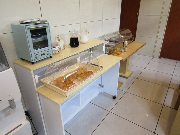 Imagen del bar/restaurante del Hotel Business Yamate Inn. Foto 3