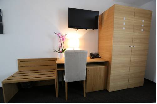 Imagen de la habitación del Hotel Businesshotel Lux. Foto 15