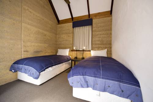 Imagen de la habitación del Hotel Bussells Bushland Cottages. Foto 2