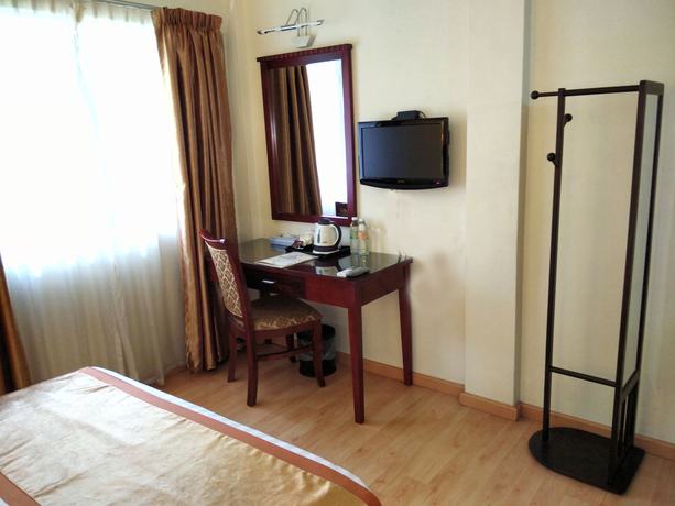 Imagen de la habitación del Hotel Bustani Hotel. Foto 2