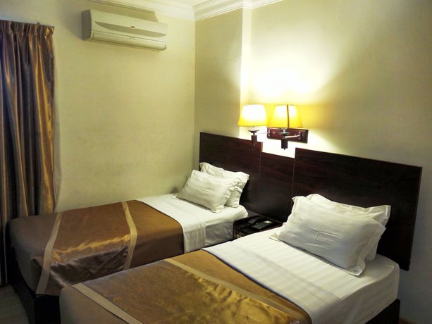 Imagen de la habitación del Hotel Bustani Hotel. Foto 3