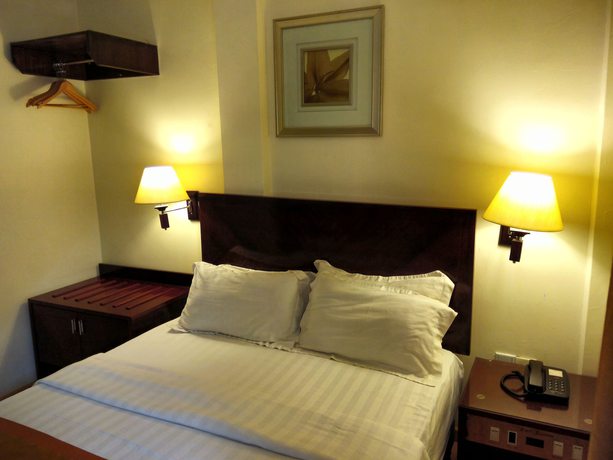 Imagen de la habitación del Hotel Bustani Hotel. Foto 12