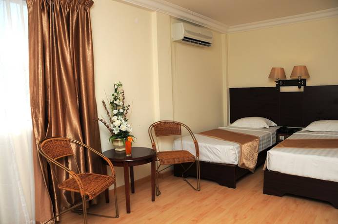 Imagen de la habitación del Hotel Bustani Hotel. Foto 15