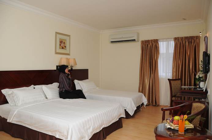 Imagen de la habitación del Hotel Bustani Hotel. Foto 16