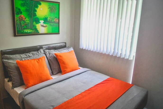 Imagen de la habitación del Hotel Butler's Bnb. Foto 17