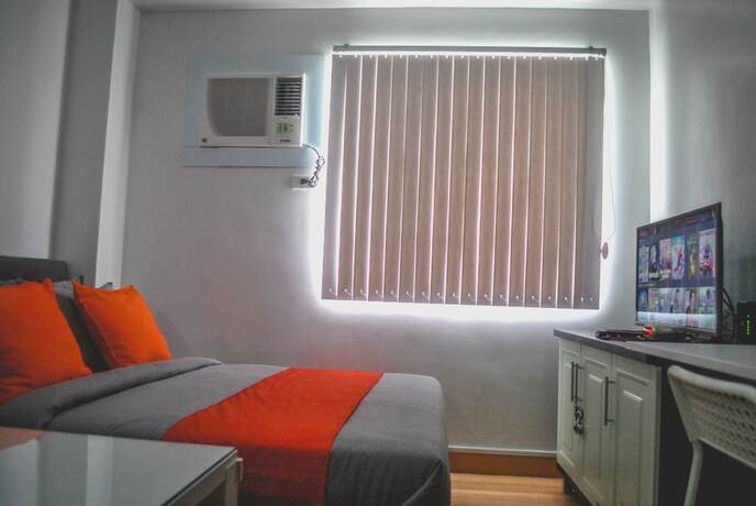 Imagen de la habitación del Hotel Butler's Bnb. Foto 18