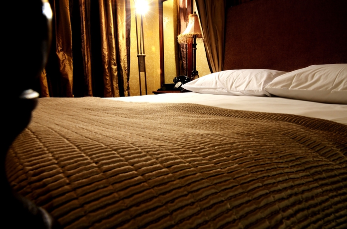 Imagen de la habitación del Hotel Butlers Townhouse. Foto 13