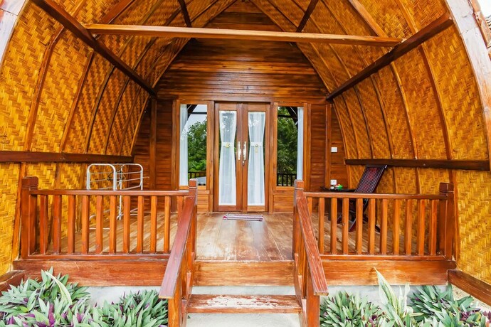 Imagen de la habitación del Hotel Butterfly Bungalows. Foto 19