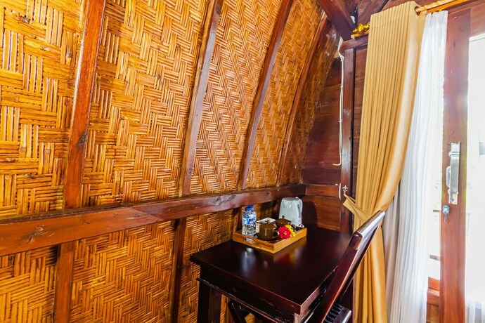 Imagen de la habitación del Hotel Butterfly Bungalows. Foto 20