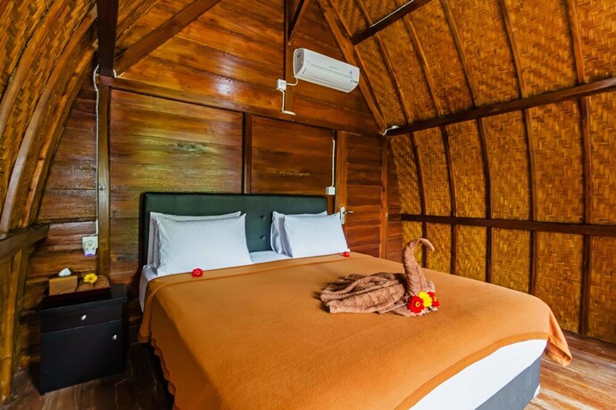 Imagen de la habitación del Hotel Butterfly Bungalows. Foto 22