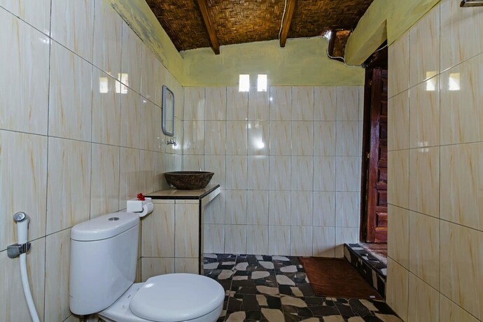 Imagen de la habitación del Hotel Butterfly Bungalows. Foto 26
