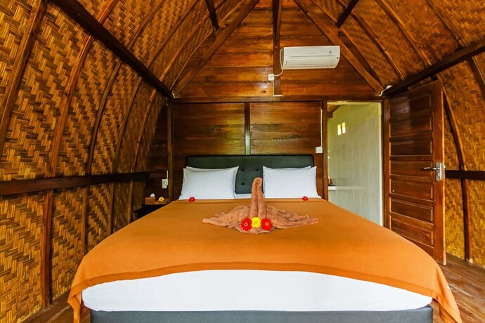Imagen de la habitación del Hotel Butterfly Bungalows. Foto 29