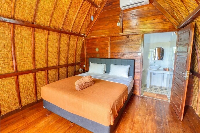 Imagen de la habitación del Hotel Butterfly Bungalows. Foto 32