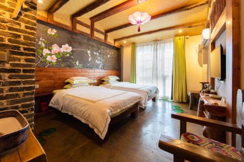 Imagen de la habitación del Hotel Butterfly Flowers Inn. Foto 15