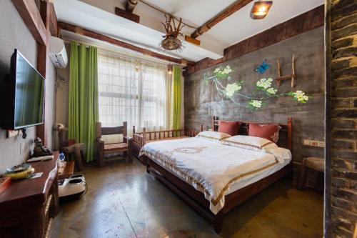 Imagen de la habitación del Hotel Butterfly Flowers Inn. Foto 18