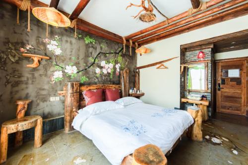 Imagen de la habitación del Hotel Butterfly Flowers Inn. Foto 19