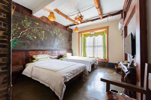 Imagen de la habitación del Hotel Butterfly Flowers Inn. Foto 20