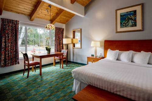 Imagen de la habitación del Hotel Butterfly Grove Inn. Foto 2