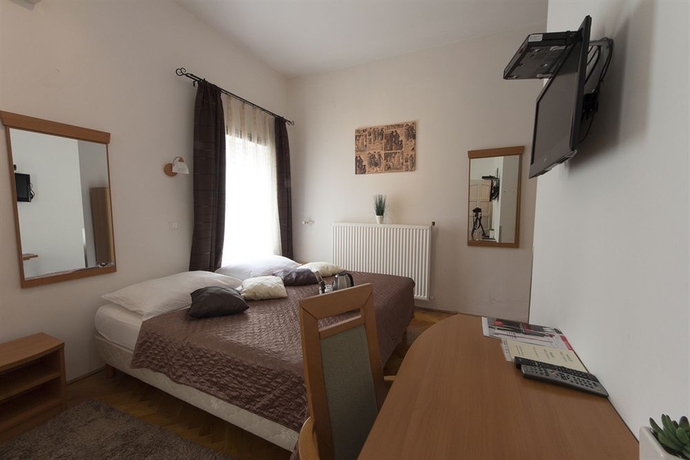 Imagen de la habitación del Hotel Butterfly Home Danube. Foto 15